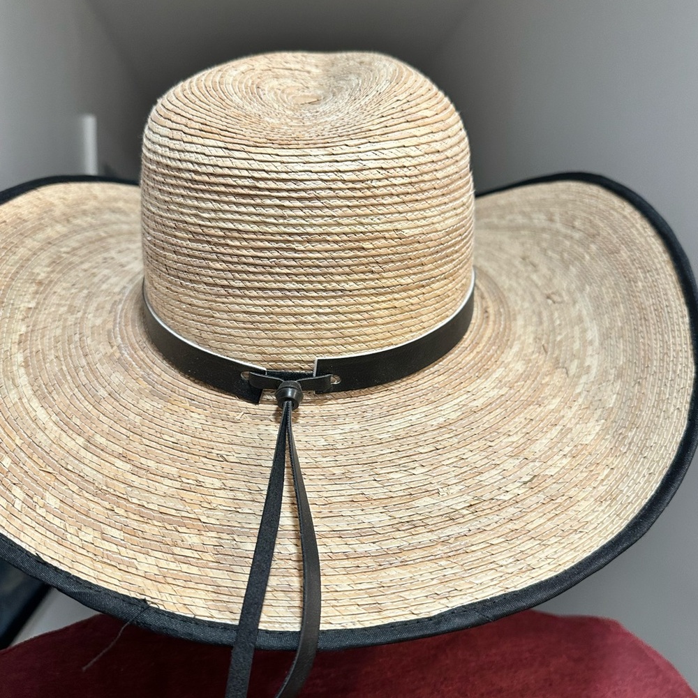 Stylish Tan Wide-Brim Hat with Black Trim
